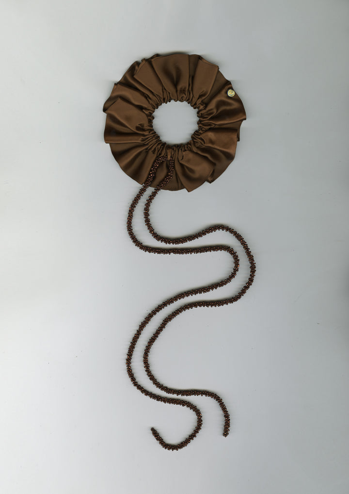 Merrma Satin Scrunchie with long, beaded cords. The scrunchie is made from luxurious satin, and the cords adorned with delicate glass beads. Can be worn together or separately for a versatile and chic look.