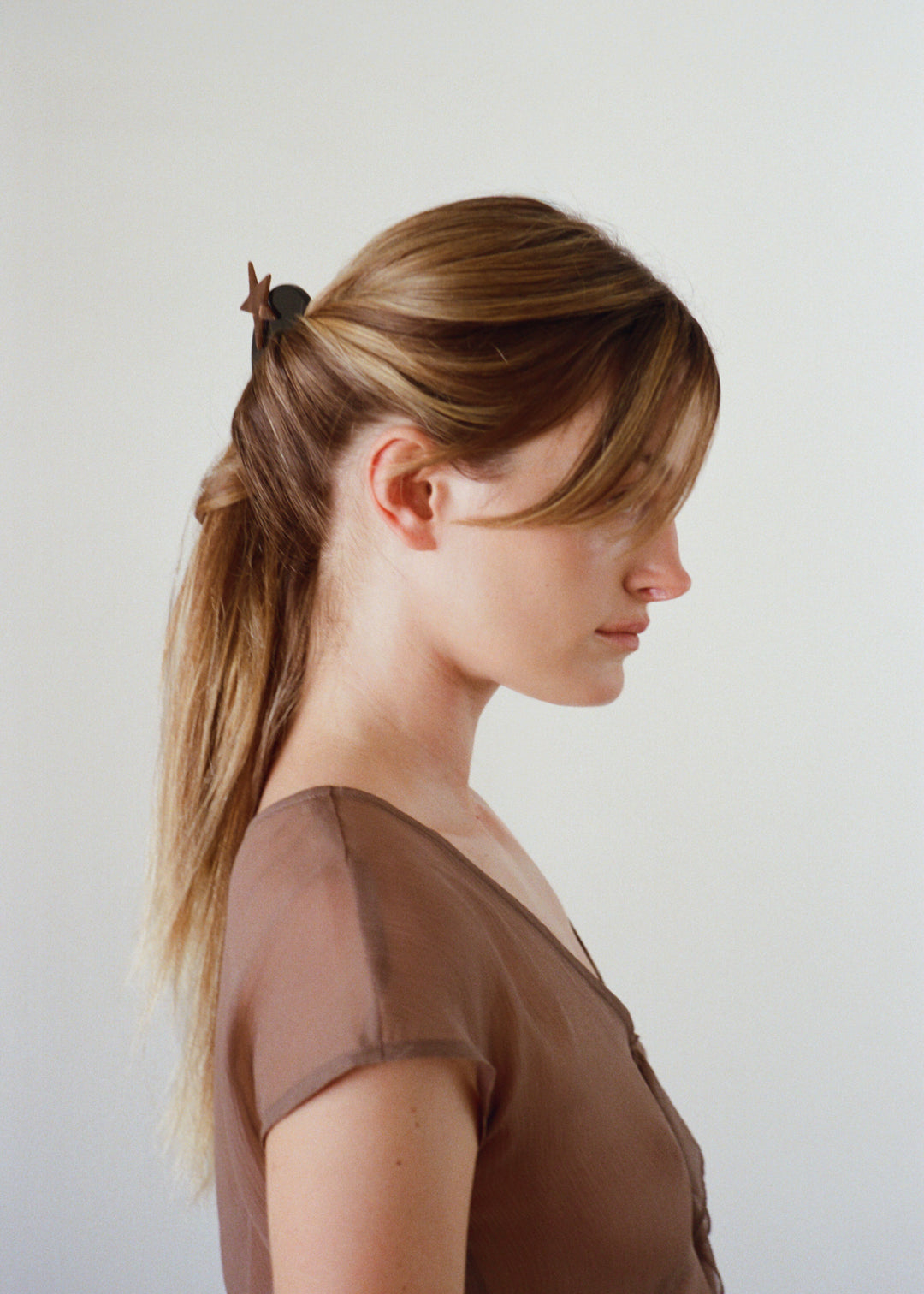Pavo Nacre Star Comb